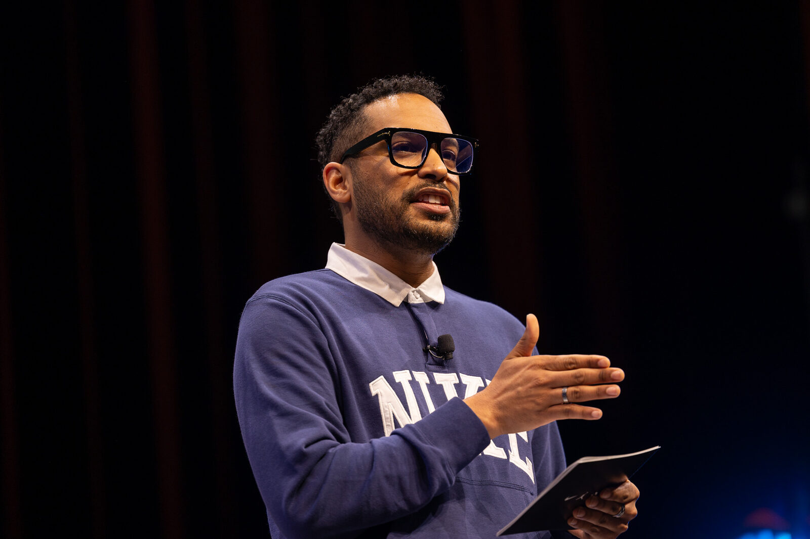 Nick Boyd, Editor in Chief of Clarity Unlocked, speaking on stage